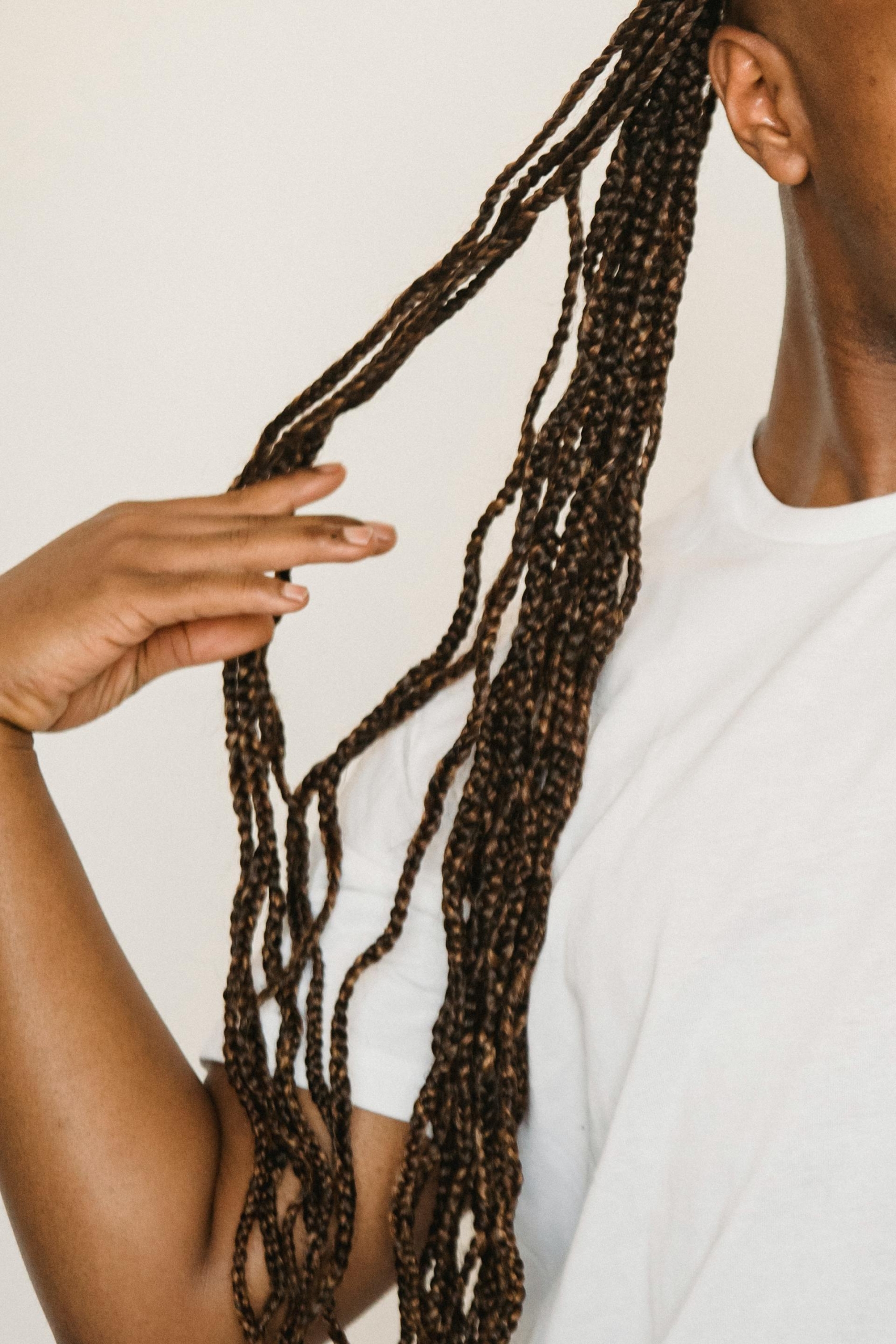 Cornrolls 4-5 braids with haircut